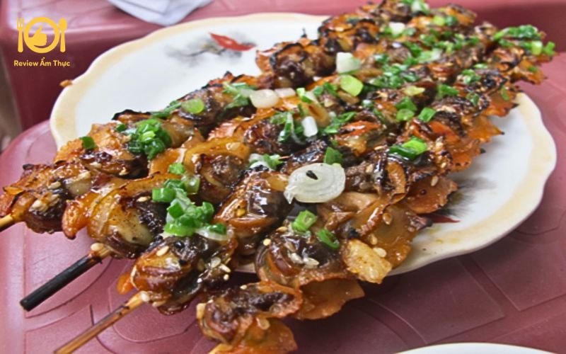 Ốc bươu nướng xiên que - Cách làm và mẹo chế biến ngon nhất 7 ốc bươu nướng xiên que