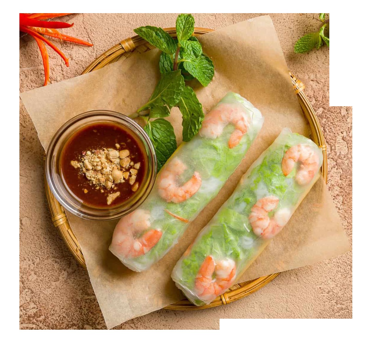 Khám phá tinh hoa Phở Việt tại A Ma's Kitchen & Pho: 40 năm hương vị gia truyền 7 Hai cuốn gỏi cuốn tôm tươi ngon được đặt trên đĩa, kèm theo nước chấm